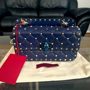 Valentino handbag width 8 inches length 5 inches